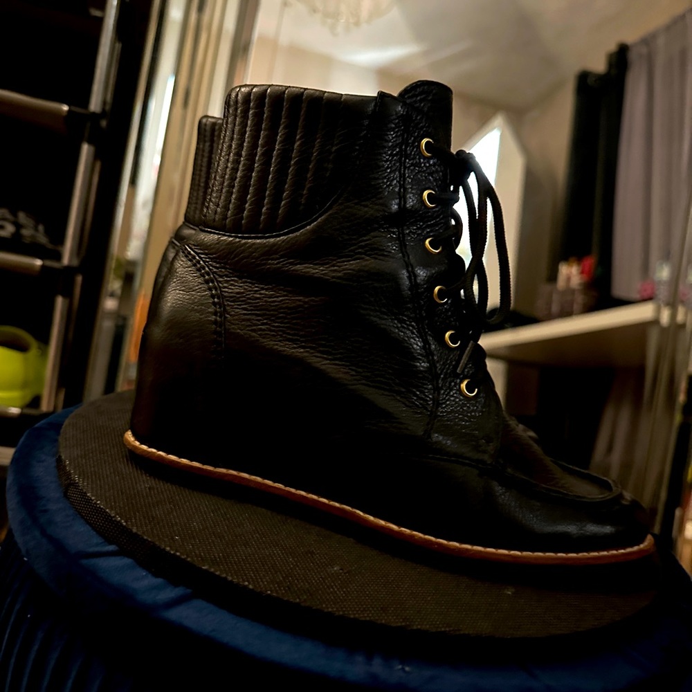 Real leather booties with wedge, worn once, warm for winter too! Like new